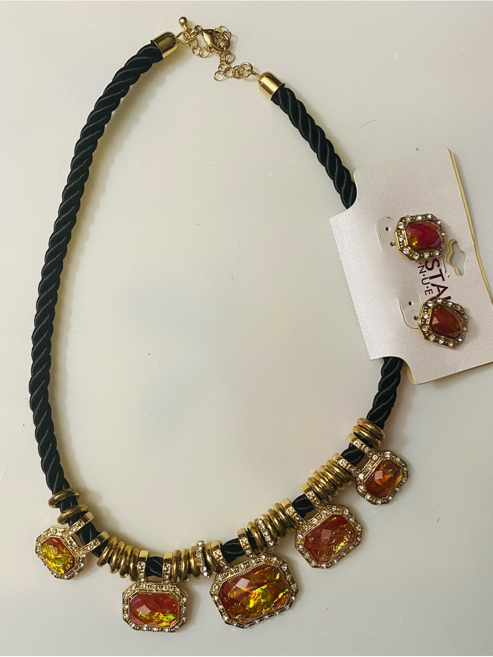 Gold-Tone Black Rope Necklace with Yellow-Orange Gem Accents